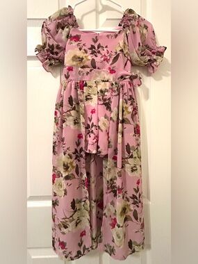 a “Bonnie Jean”  Floral "Walk-Through" Romper. Young girl size 7